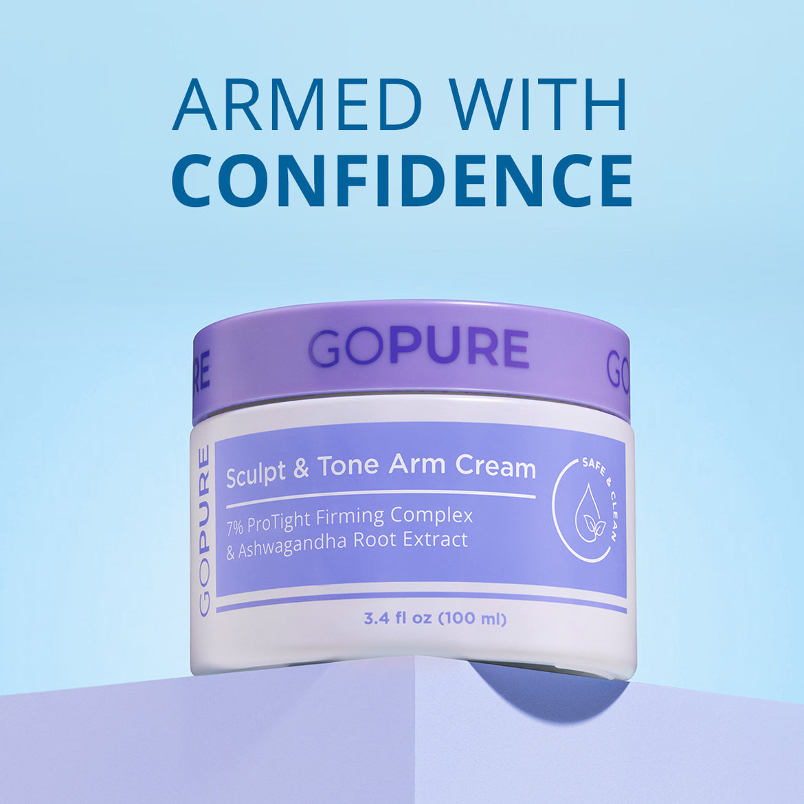 The image shows a jar of “GOPURE Sculpt & Tone Arm Cream” with the tagline “ARMED WITH CONFIDENCE” above it. The product label highlights ingredients like “7% ProTight Firming Complex & Ashwagandha Root Extract.” The background is a gradient of light blue, giving a clean, fresh aesthetic, and the product jar is positioned to create a soft shadow below.