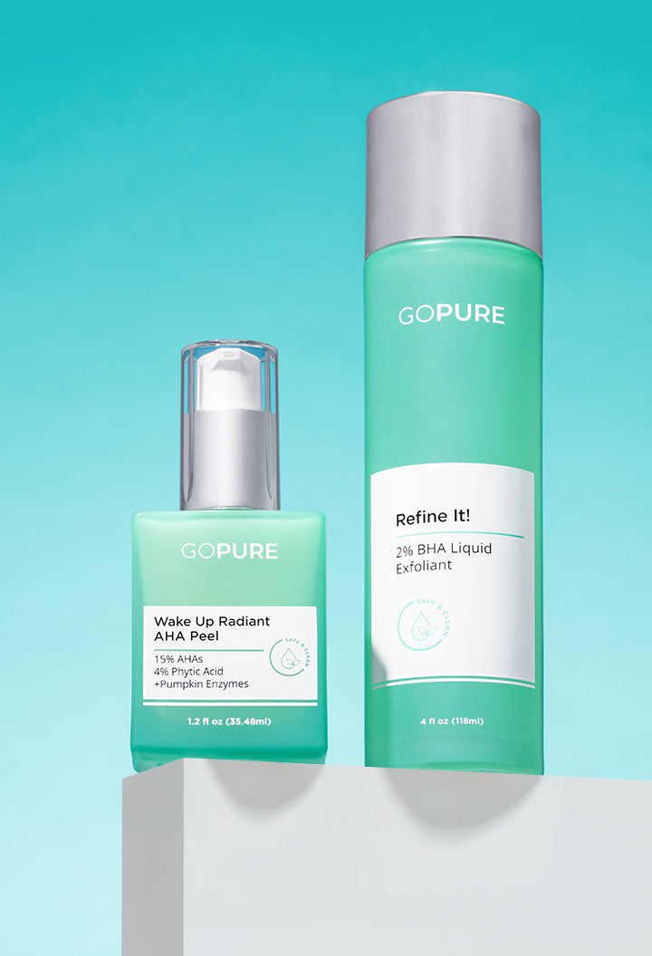 Two GOPURE skincare products displayed against a turquoise gradient background. On the left is 'Wake Up Radiant AHA Peel' in a light green rectangular pump bottle with a silver dispenser. On the right is 'Refine It! 2% BHA Liquid Exfoliant' in a taller light green cylindrical bottle with a silver cap. Both feature white labels with clean text and minimalist design.