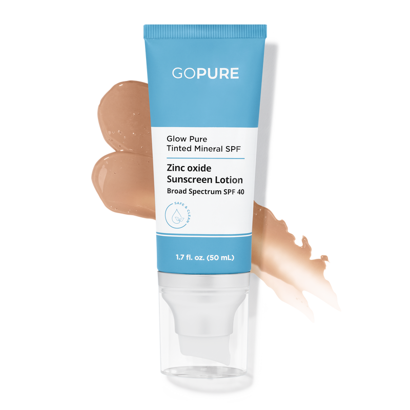 Tube of GoPure's Glow Pure Tinted Mineral SPF Sunscreen Lotion with a swatch showing the tinted formula. Zinc oxide based, Broad Spectrum SPF 40, in a 1.7 fl oz size.